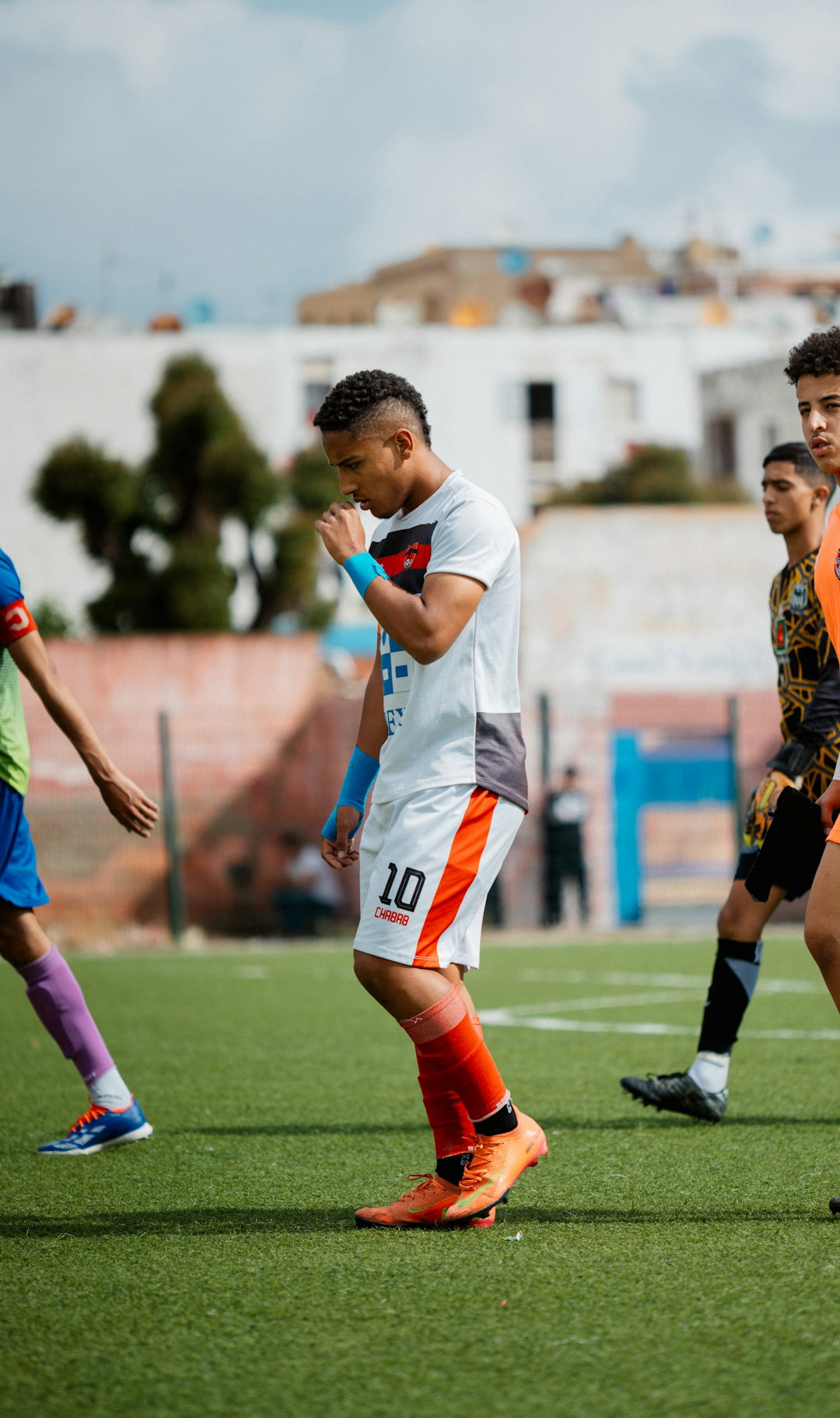 Soccer players are on the field after a game